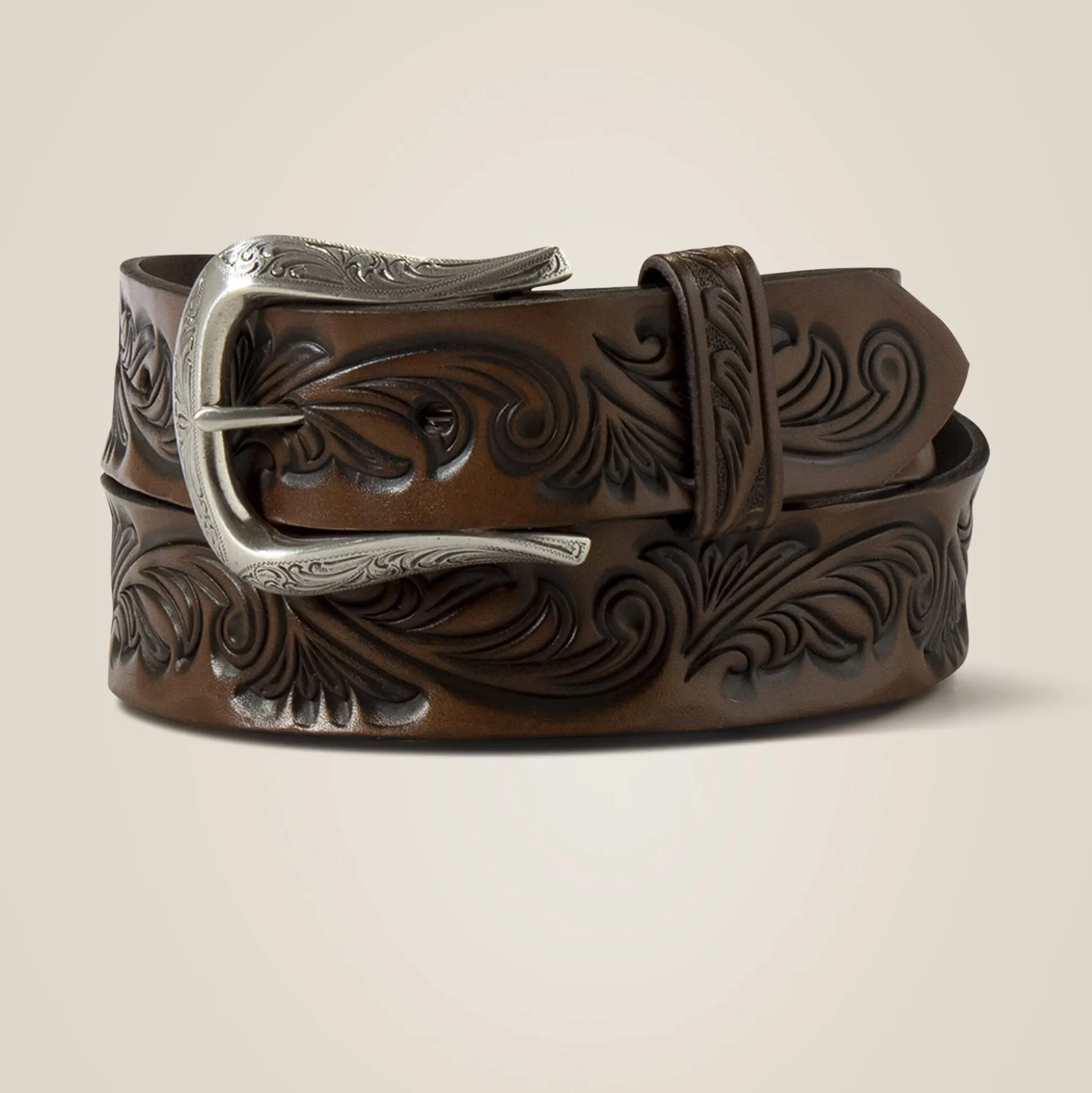 Filigree embossed belt